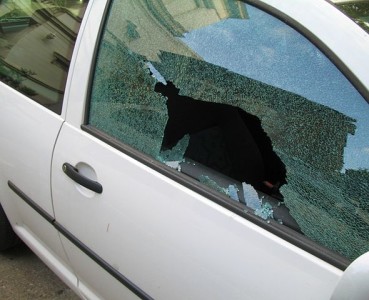 stolen GPS broken window car